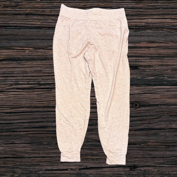 Lululemon Athletica Cream Track Pants with Elastic Waistband and Tapered Legs - Picture 2 of 3